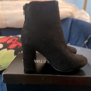 Black heeled booties